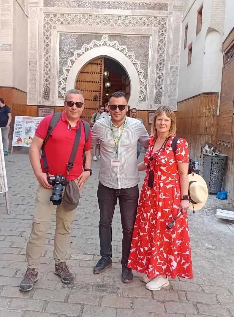 Hassan Tebbal – Fes Expert Guide leading travelers through the historic medina of Fes