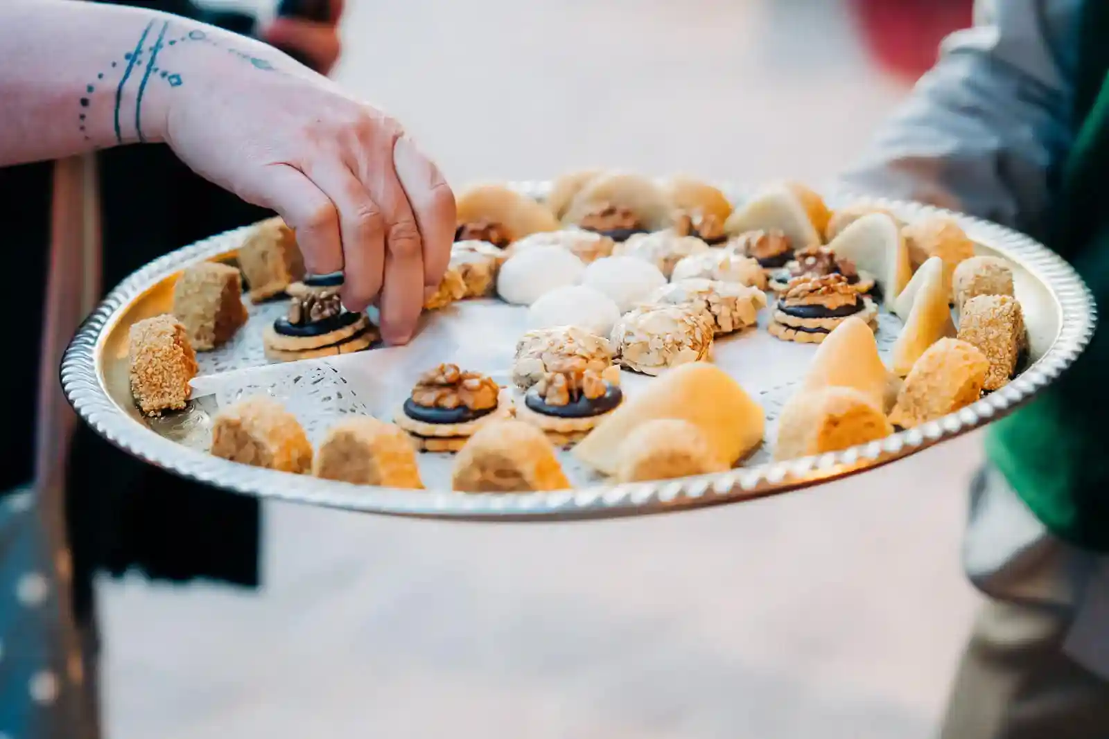 Moroccan Pastries Hospitality Serving Silver tray with Moroccan pastries served at a hospitality event.