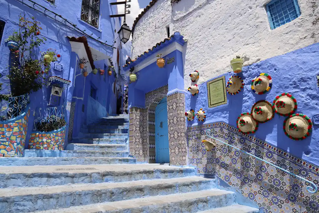 Chefchaouen blue city street in Morocco covered by Morocco Quest DMC ground services