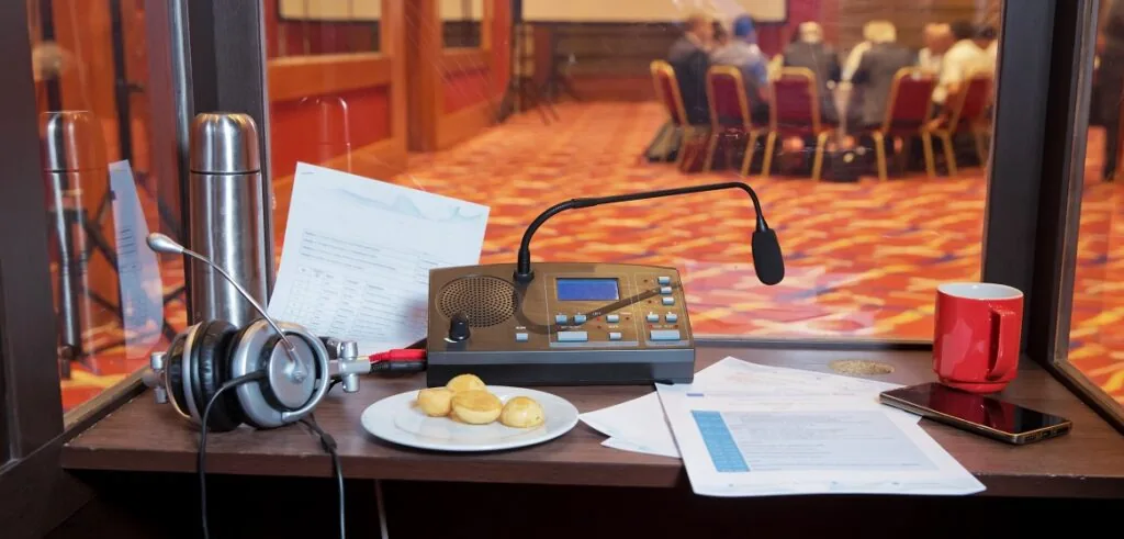 Simultaneous interpreting booth and headset console at a Morocco Quest conference in Marrakech