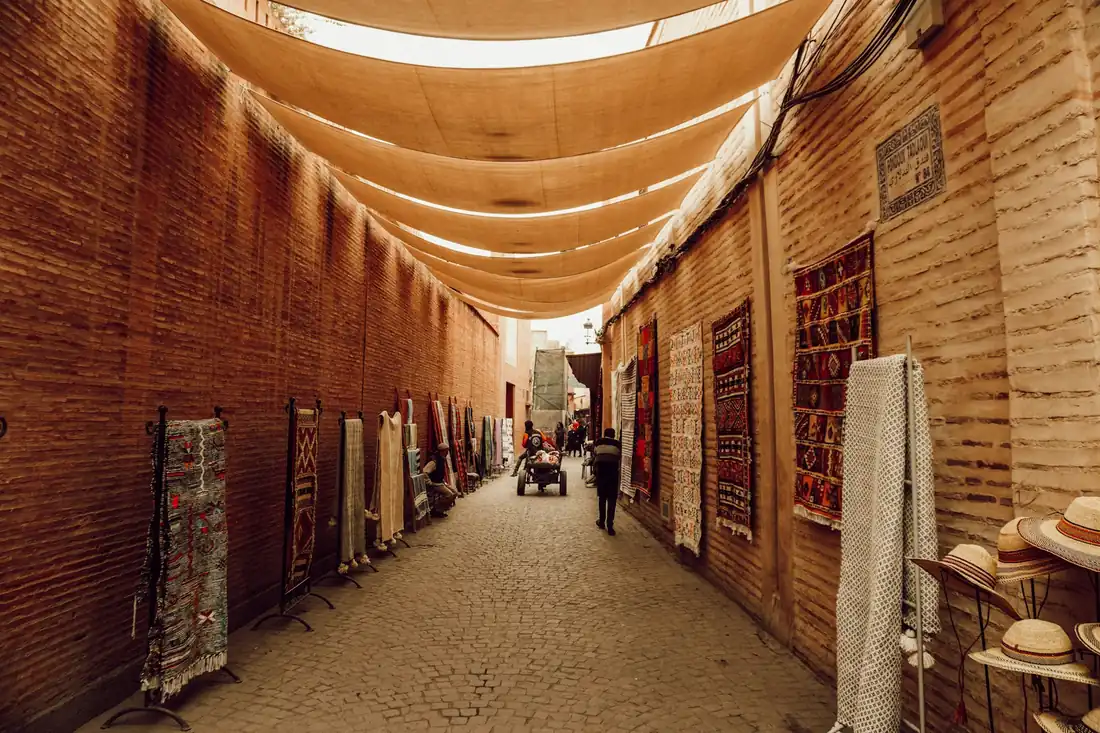 Covered souk alley in the Marrakech medina used for Morocco Quest team-building souk rallies