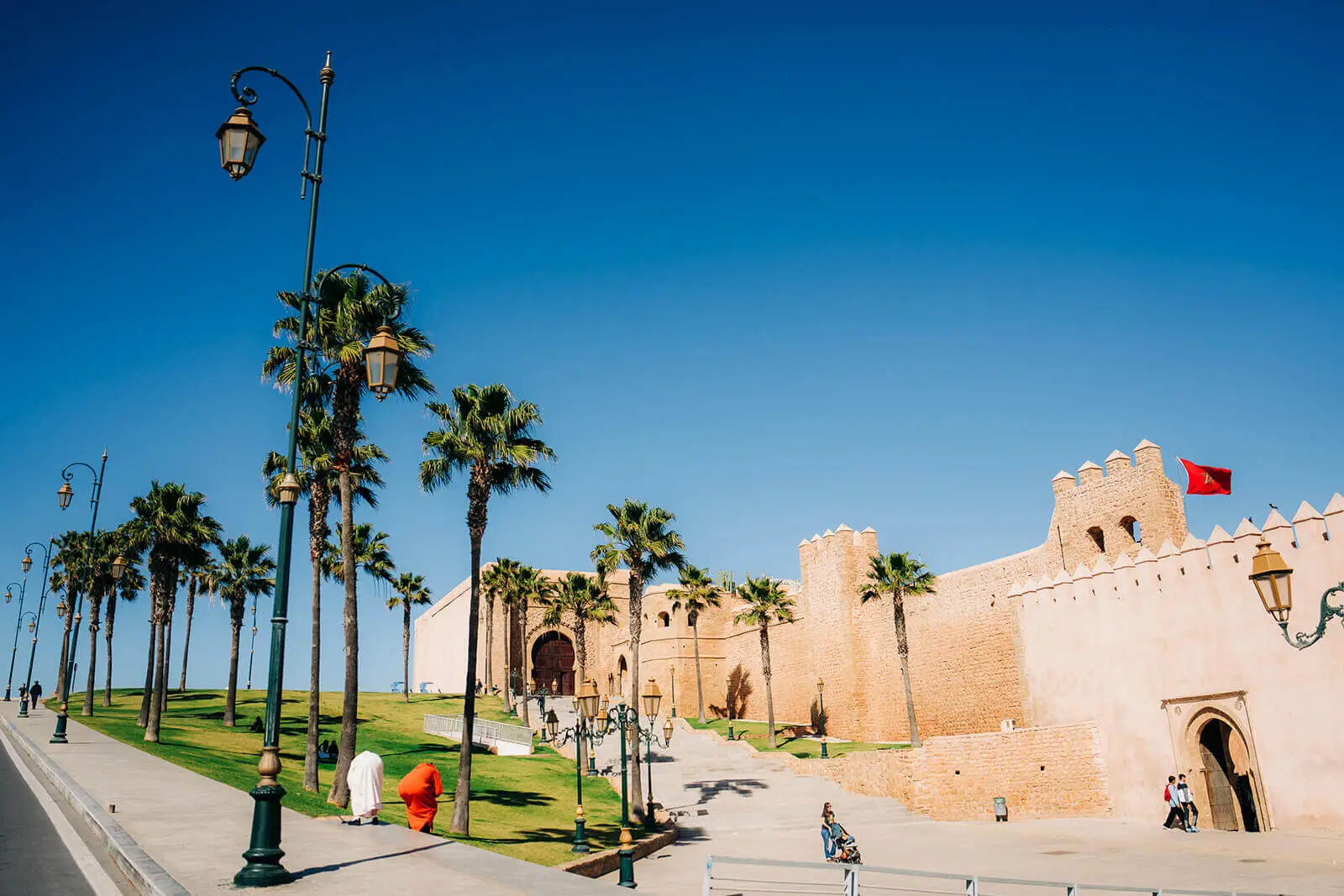 A glimpse of the iconic Oudaias Kasbah with its striking blue and white walls, overlooking the Atlantic Ocean in Rabat.